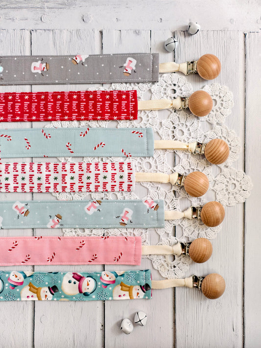 Clip portaciuccio in tessuto natalizio